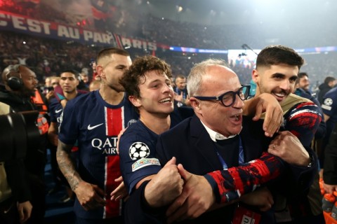 PSG players, including Joao Neves (C), and sporting director Luis Campos celebrate at the Parc des Princes after reaching the Champions League final