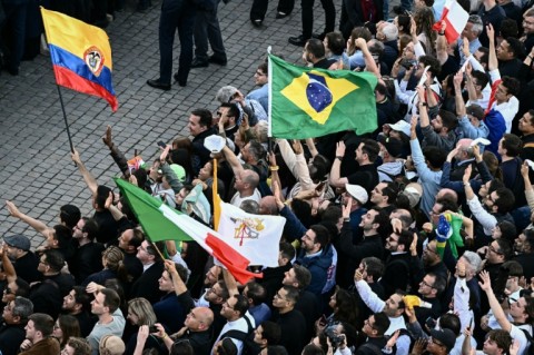 Thousands are gathered in St Peter's Square to learn the name of the new pope
