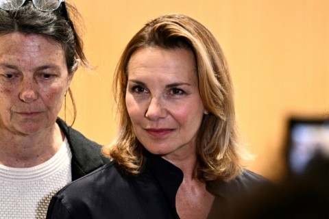 One of the plaintiffs, Amelie, speaks to the press after a Paris court convicted French cinema icon Gerard Depardieu of sexually assaulting her and another woman