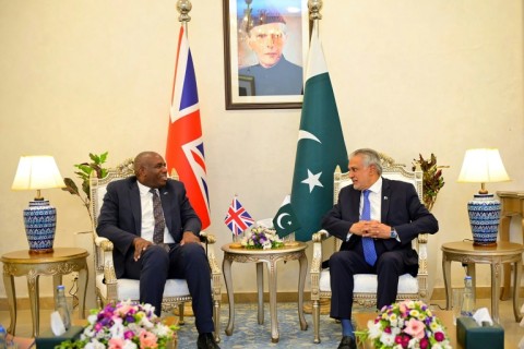 A handout photo taken and released on May 16 by Pakistan's Ministry of Foreign Affairs, shows Pakistan's Foreign Minister Ishaq Dar (right) and Britain's Foreign Secretary David Lammy in Islamabad