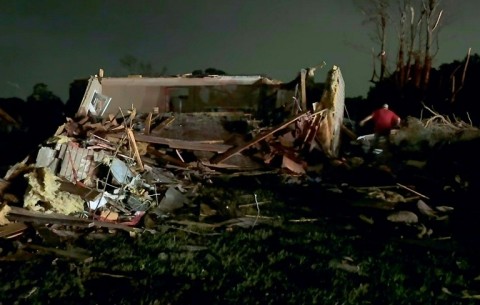 Local residents search through tornado damage in Laurel County near London, Kentucky