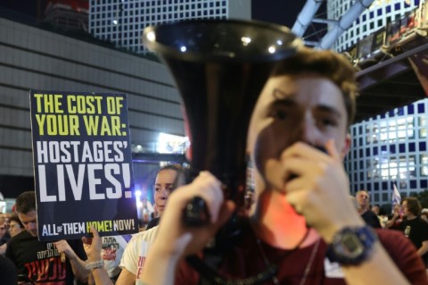 Israeli demonstrators at an anti-government protest calling for action to secure the release of hostages held in Gaza