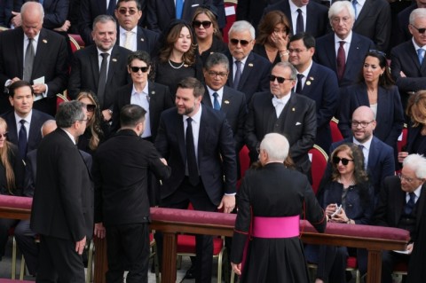 Ukrainian President Volodymyr Zelensky (2nd L) was in the Vatican at Pope Leo's inauguration mass, where he shook hands with US Vice President JD Vance (C)