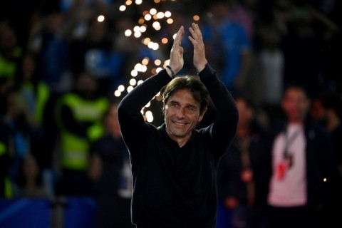 Antonio Conte will stay on as Napoli coach after winning the Serie A title