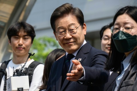 Both frontrunner Lee  of the liberal Democratic Party and conservative challenger Kim Moon-soo have cast the race as a battle for the soul of the country