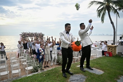 Song and Wang were surrounded by dozens of close friends and their ring-bearing small fluffy dog on their wedding day