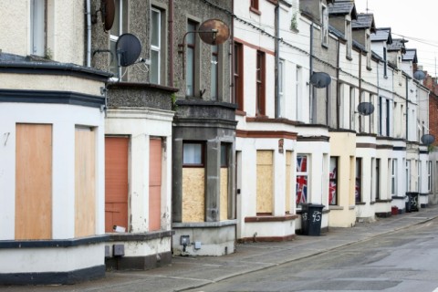 Boarded up houses after a second night of riots in Ballymena, Northern Ireland