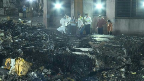 Debris and destruction at Air India crash site