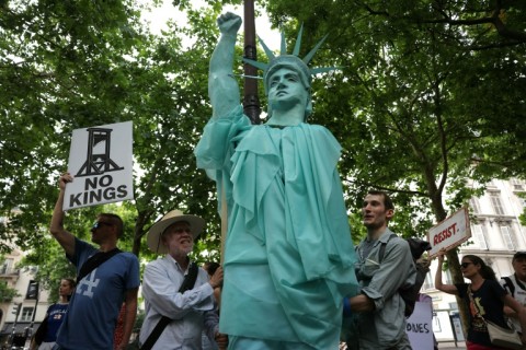 Troops march along Constitution Avenue during the military parade in Washington