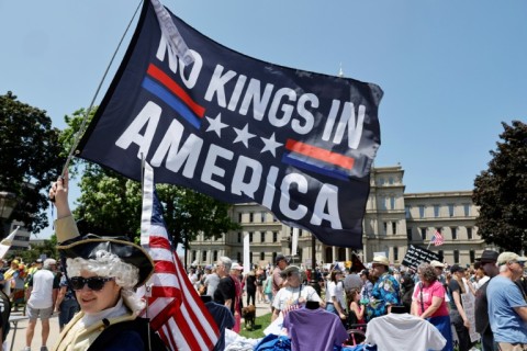 Demonstrators at a "No Kings" protest outside the Michigan Capitol in Lansing, Michigan