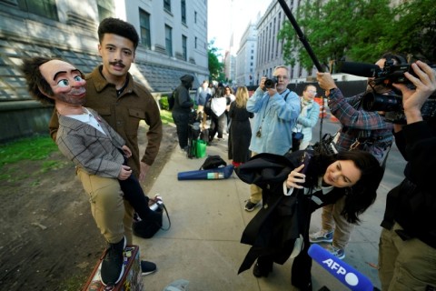 The Sean Combs trial has drawn a wide variety of characters, along with influencers and YouTubers, including Emilie Hagen, shown right taking footage on her phone