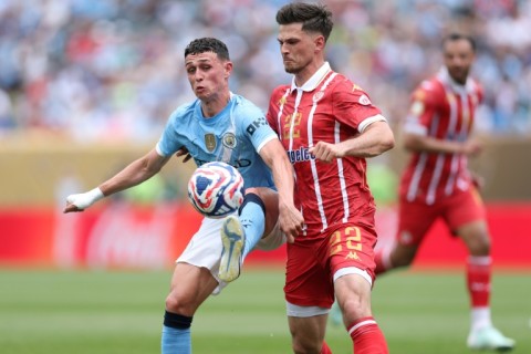 Phil Foden (L) scored one goal and made another as Manchester City defeated Wydad Casablanca 2-0 in Philadelphia