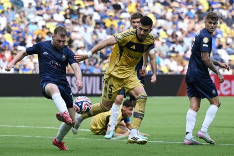 Auckland City upset the odds to hold Boca Juniors as both teams exited the competition