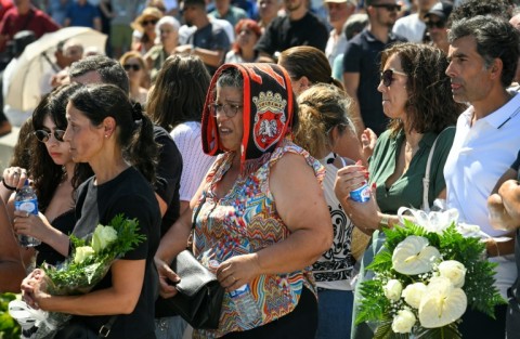 People wait outside the funeral chapel for the public wake of Diogo Jota and his brother Andre Silva in Gondomar