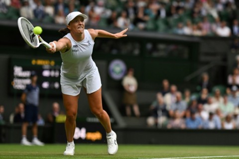 Poland's Iga Swiatek in action at Wimbledon