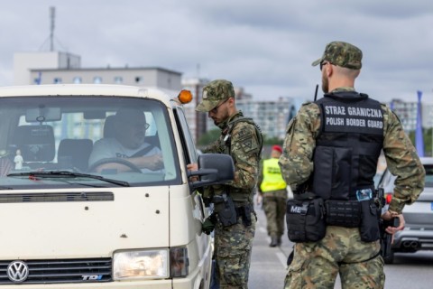 Polish border guards check drivers at the Polish-German border in Slubice, western Poland