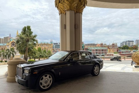 A Rolls-Royce parked outside the centerpiece Kings Romans Casino, part of the Kings Romans Group founded by Chinese businessman Zhao Wei, who is under US and British sanctions
