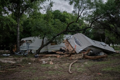 Debris lays along the Guadalupe River after flash flooding in central Texas with more than 100 fatalities reported