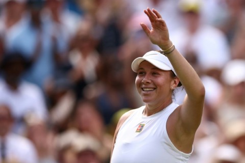 Amanda Anisimova celebrates after beating Aryna Sabalenka to reach the Wimbledon final