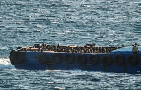 The freeze on asylum claims has been criticised by rights groups as a violation of international and EU law