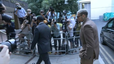 US R&B artist Chris Brown arrives at UK court for assault plea