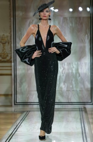 Armani, absent on doctors' orders, said he had overseen 'every aspect' of his collection