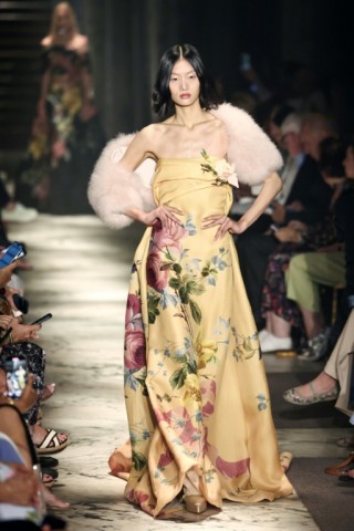 Chinese model Yilan Hua presents a rose-embellished creation for Elie Saab