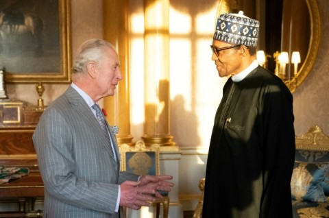 Britain's King Charles III (L) met with the late former president of Nigeria Muhammadu Buhari during an audience at Buckingham Palace in 2022