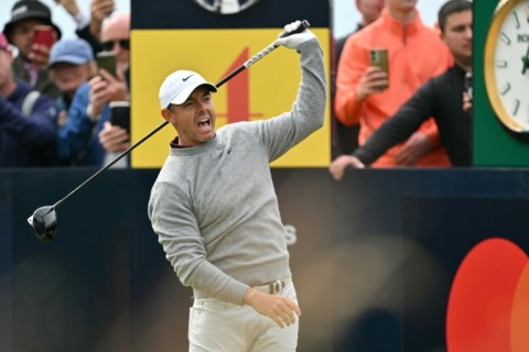 Rory McIlroy hit a wayward drive on the first tee