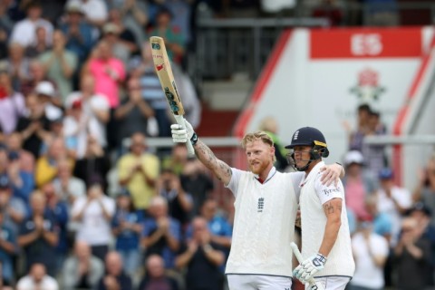 England captain Ben Stokes (L) celebrates after scoring a century in the fourth Test against India at Old Trafford