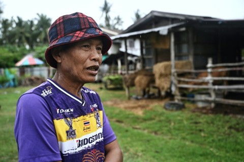 Farmer and village co-leader Keng Pitonam refuses to evacuate from his village despite ongoing clashes