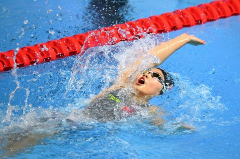 China's swimmer Yu Zidi competes in a semi-final of the women's 200m individual medley