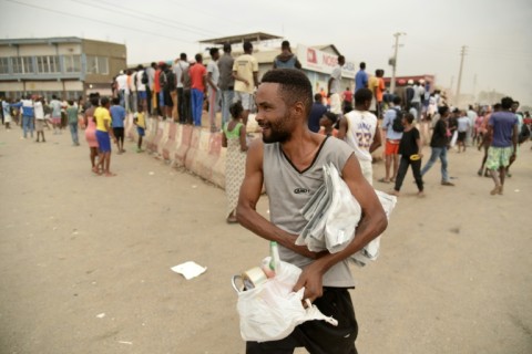 Looting erupted in Luanda on Monday, the first day of a strike against the rising prices of fuel