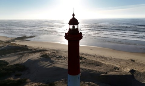 This aerial picture shows a French lighthouse threatened by coastal erosion