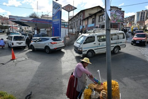 Long lines for fuel at petrol stations have become a defining image of Bolivia's worst economic crisis in a generation