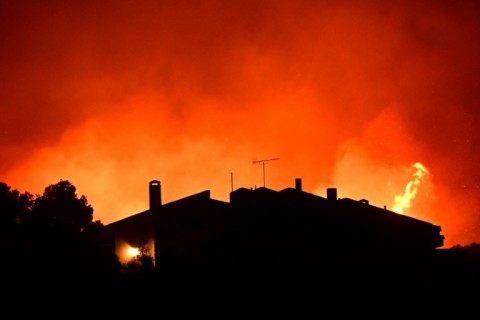 Over 200 firefighters had battled to keep the fire from threatening the coastal resorts dotting the coast of Attica