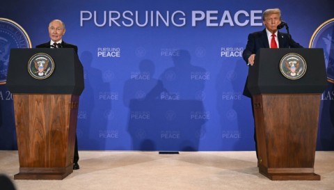 France's President Emmanuel Macron (L), Germany's Chancellor Friedrich Merz and Britain's Prime Minister Keir Starmer are due to hold a video call on Ukraine