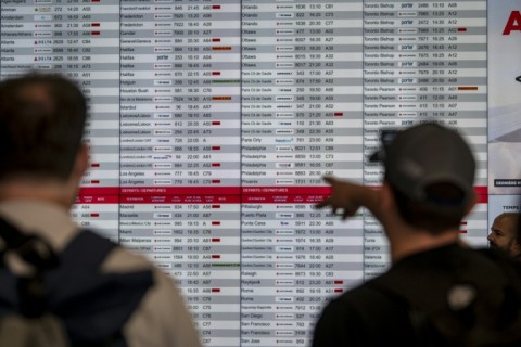 A flight board after canceled flights in Montreal