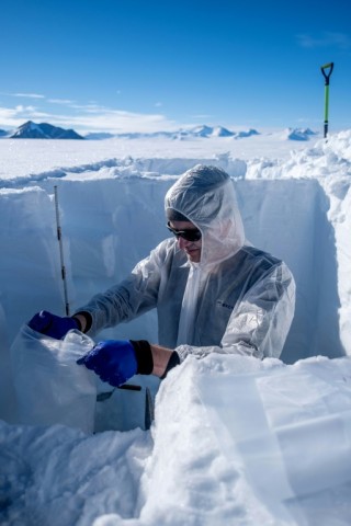 Scientists work to measure the contamination of heavy metals in the pristine snow and ice