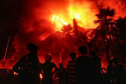 The building of Makassar City Council is set on fire during a protest that left at least three people dead
