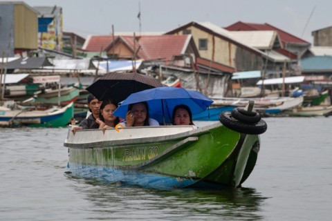 With high tides flooding the streets at least three times a week, the sea already dictates the rhythm of daily life on Pugad