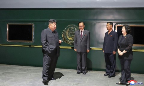 This picture taken on September 1, 2025 and released from North Korea's official Korean Central News Agency via KNS shows Kim outside his train