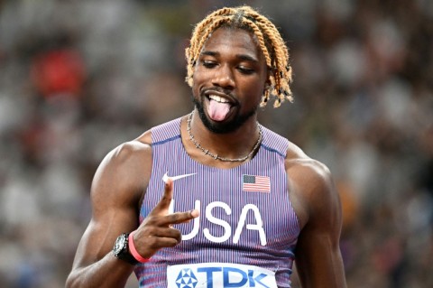 US sprinter Noah Lyles celebrates after winning his 100m heat at the World Athletics Championships