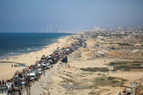Palestinians move with their belongings southwards on a road in the Nuseirat refugee camp area in the central Gaza Strip following Israeli evacuation orders for Gaza City on September 14, 2025