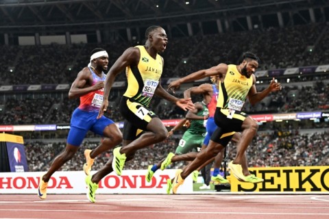 Oblique Seville beat fellow Jamaican Kishane Thompson to gold in the men's 100 metres