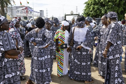 Supporters in favor of a 'yes' vote gather for a rally in Conakry on September 18, 2025