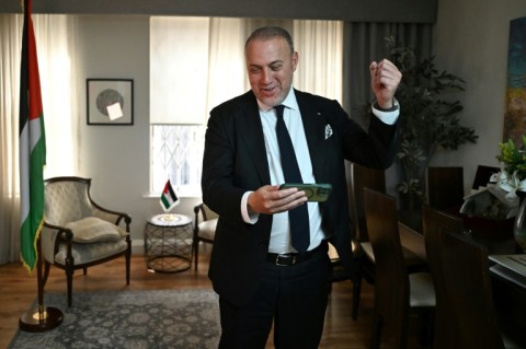 Head of the Palestine Mission to the UK, Husam Zomlot, celebrates after Starmer formally recognised a Palestinian state