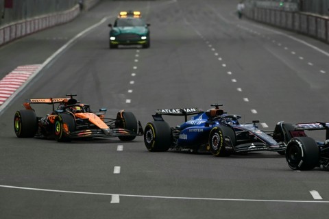 McLaren's Oscar Piastri (L) will want to forget the Azerbaijan Grand Prix after making a false start that dropped him to last and then hitting a wall on the opening lap