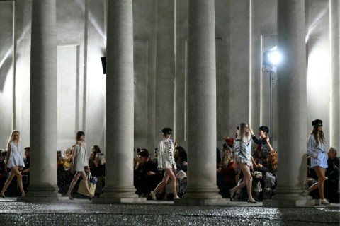 many models wore just swim briefs, shorts were rolled up and mini dresses became open-backed t-shirts.