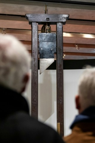 A museum has assembled a 800-kilogram (1,700-pound) guillotine as part of reflection on Badinter's legacy